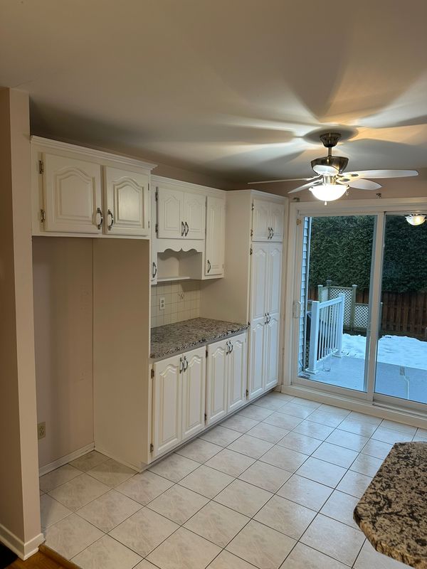 Kitchen cabinet refinishing with smooth spray finish